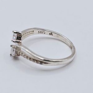 ANILLO DOBLE ONDA CON CUBICS Y DOS STRASS