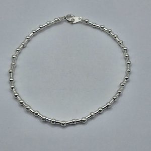 PULSERA DE PLATA BOLITAS Y TUBITOS
