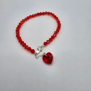 PULSERA SWAROVSKI Y PLATA CON CORAZON SWAROVSKI ROJO